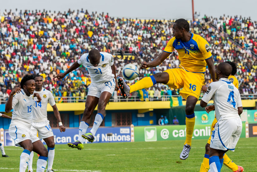 Ernest Sugira (#16) jumps for the ball during the game against Gabon on Wednesday. The striker scored a brace to ensure Rwanda finish top of Group A. (File)