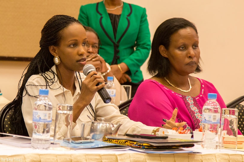 RDB Chief Tourism Officer Belise Kariza explains the need to end sexual harassment in the hospitality industry as Minister for Gender and Family promotion Oda Gasinzigwa looks on. (Doreen Umutesi)rn