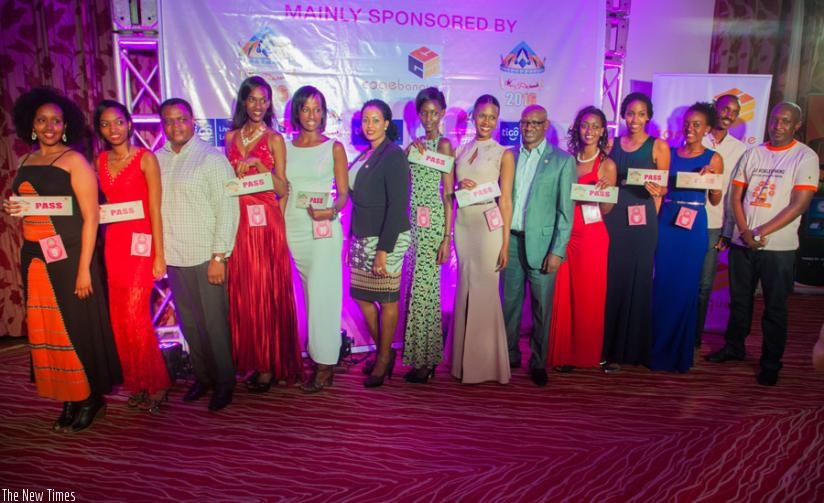 Pre-selected girls in Kigali pose with members of main sponsor Cogebanque. (Faustin Niyigena)