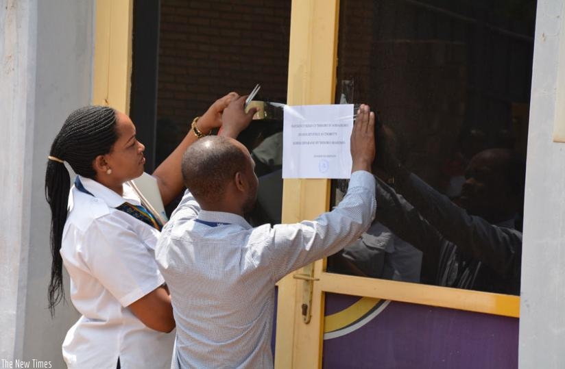 RRA workers close a business entity for not paying taxes. (File)