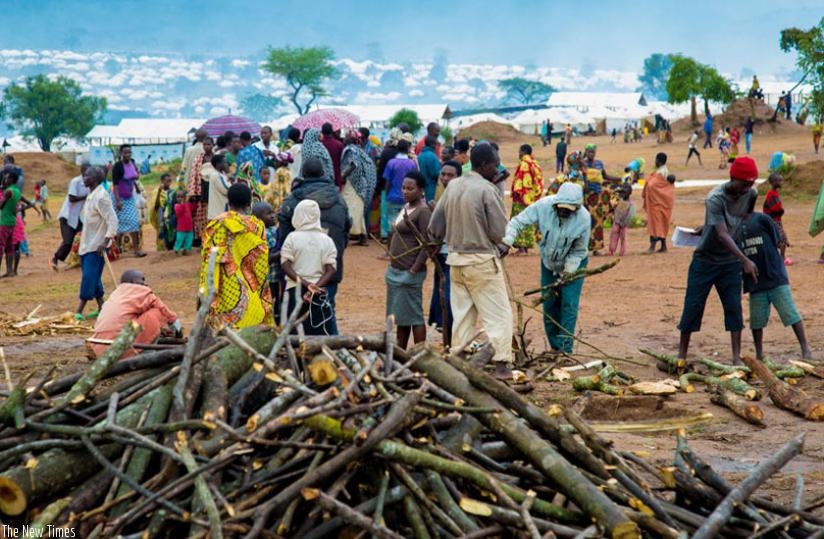 Some Burundian refugees line up to receive firewood at Mahama Refugee camp in Kirehe District, last year. (File)
