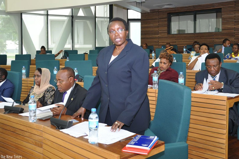 Dr Nyiramirimo presenting the report before EALA in Arusha. (Courtesy photo)