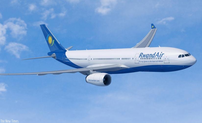 A RwandAir airplane takes to the skies. EAC aviation industry players want implementation of open airspace to be expedited. (File)