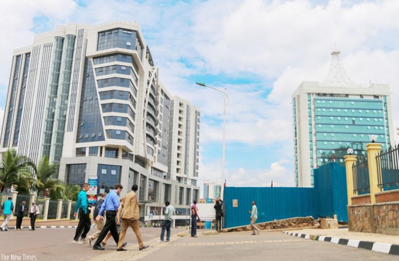 Pedestrians walk in the Kigali car-free zone. (T. Kisambira)
