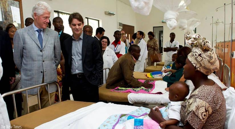 Former US President Bill Clinton (L) and Philanthropist Paul Farmer tour Butaro Cancer Center in Burera District. (File)