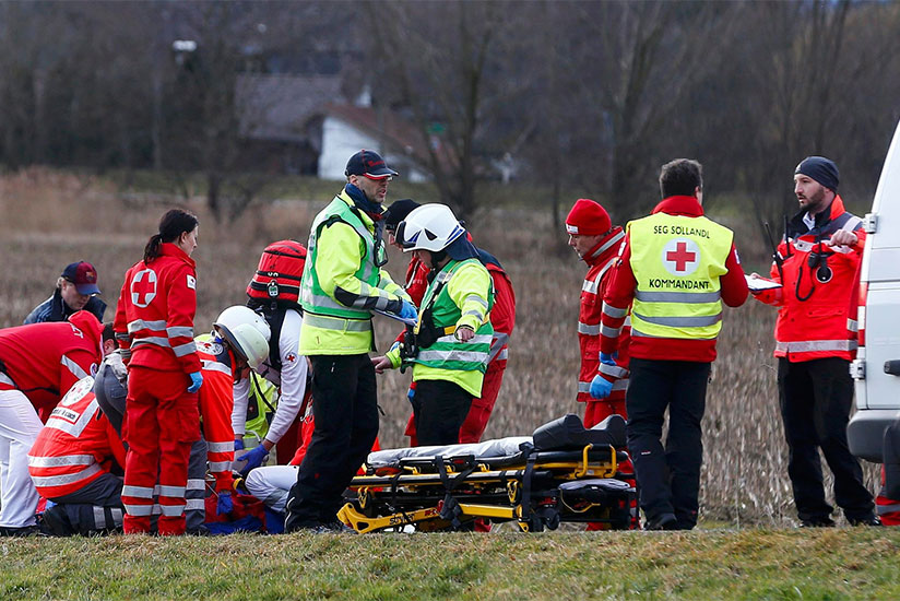 Paramedics attend to a crash victim. (Photograph: Michael Dalder/Reuters)