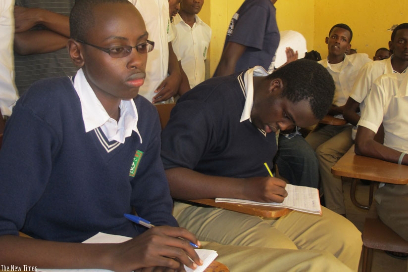 Students attend a lesson. Timely payment of school fees improves concentration during class work. (Solomon Asaba)
