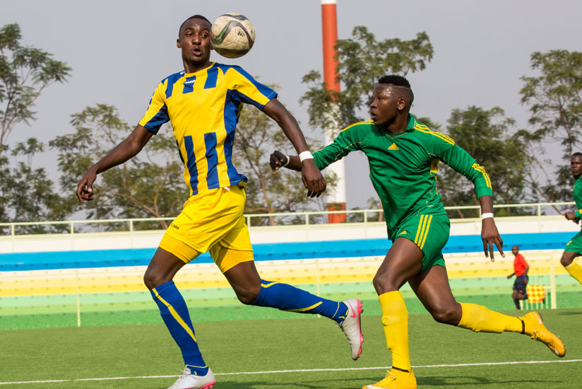 AS Kigali forward Ernest Sugira (left) scored the only goal to keep his team on top of the league table with a 1-0 win over Marines on Friday. (Timothy Kisambira)