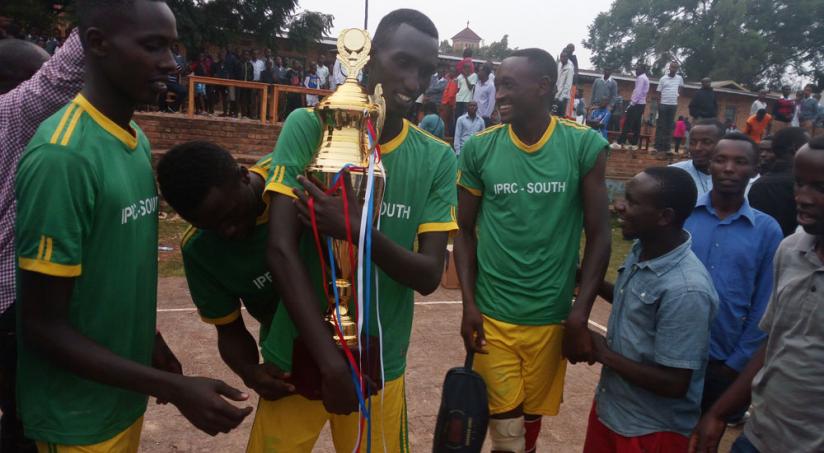 Debutants IPRC-South players celebrate with their supporters after winning this year's tournament.rn(G. Asiimwe)
