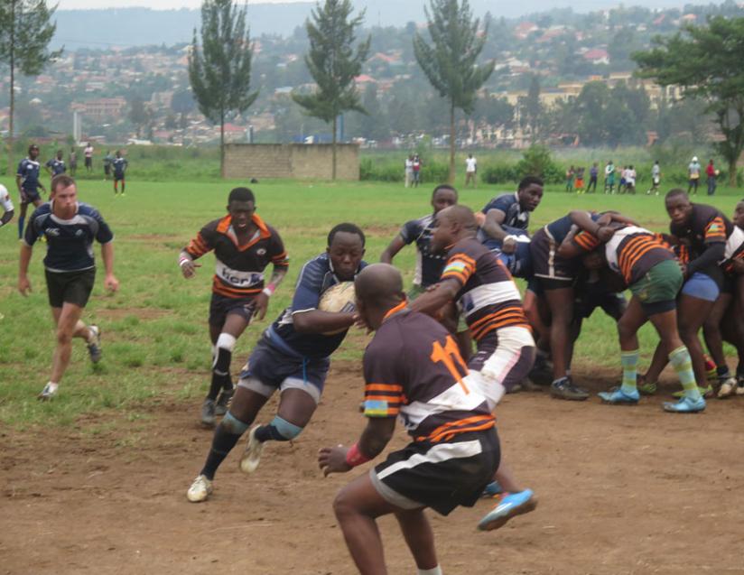 Thousand Hills' Fidel Castro Mugabo looks for a gap in Remera's defence line on Saturday at Utexrwa. (S. Kalimba)