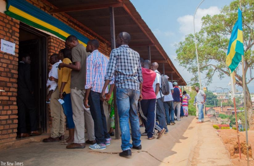 Voters line up at Sainte Famille polling station during referendum last year. (File)