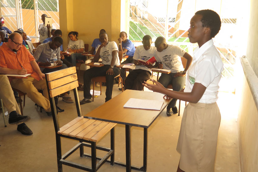 A student presents topics before colleagues during a debate session at Lycee de Kigali. (Solomon Asaba)