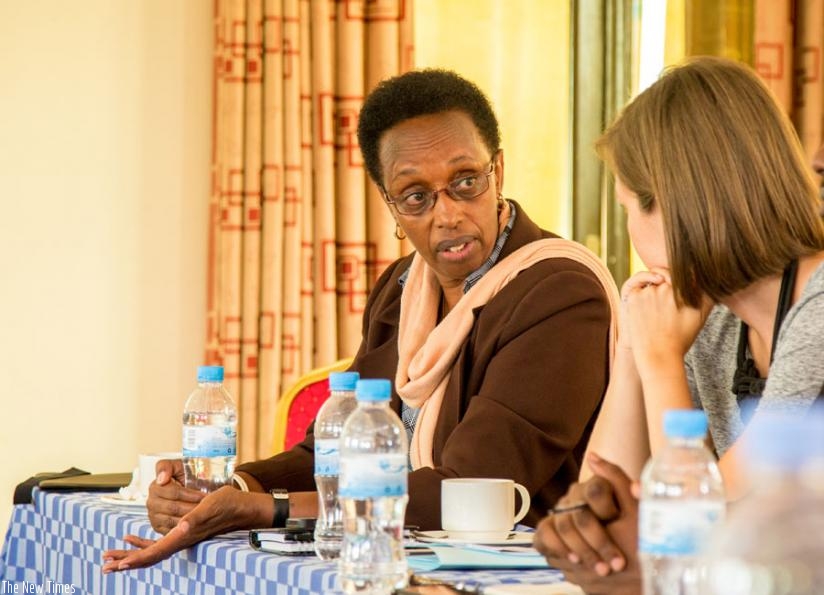 Dr Gasingirwa (L), talks to Hanna Doller programme Officer at the Embassy of Sweden in Kigali. (Doreen Umutesi)