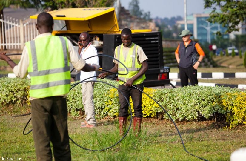 Workers lay fibre optic cables in Kimihurura in Kigali last year. (File)