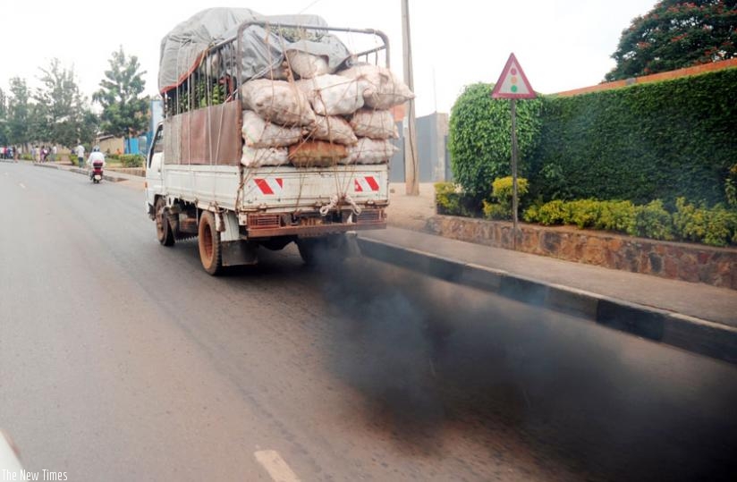 A vehicle on Kanombe- Remera road emits black smoke. (File)
