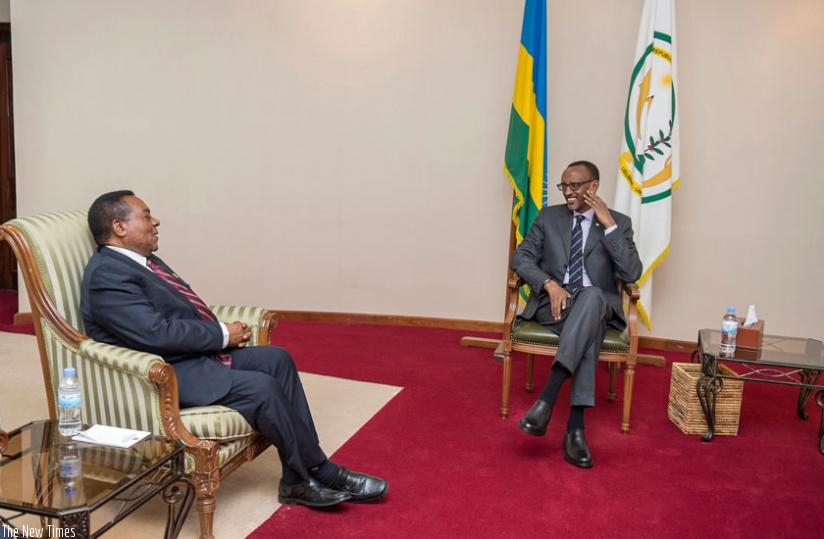 President Kagame meets with Amb. Augustino Phillip Mahiga, the Tanzanian minister for foreign affairs, at Village Urugwiro in Kigali yesterday. (Village Urugwiro)