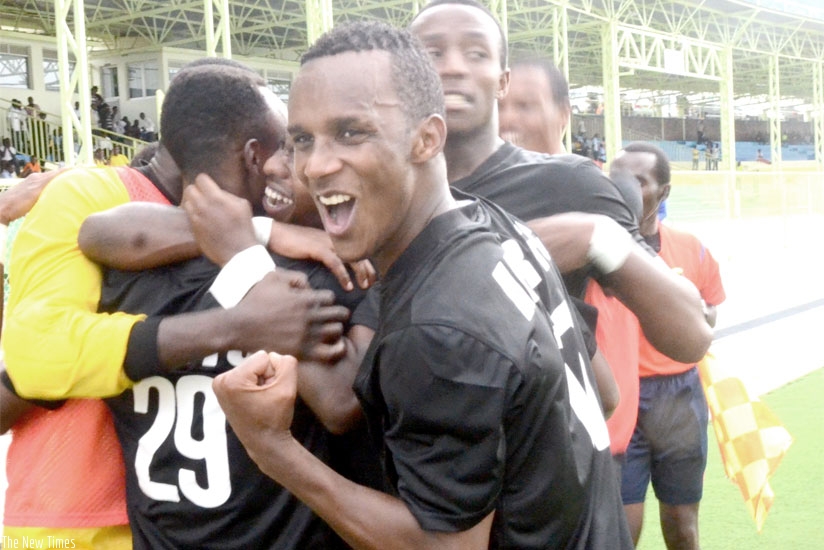 Patrick Sibomana leads his APR teammates in celebrations after Fiston Nkezingabo (#26) had scored the first goal on Saturday. (Sam Ngendahimana)