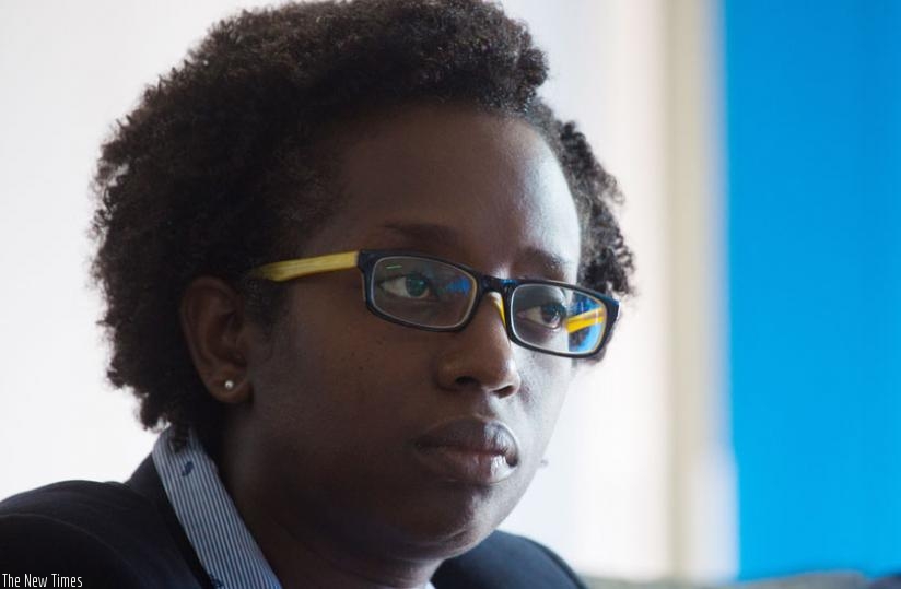 Dr Diane Karusisi the new Bank of Kigali CEO, listens to a question from the media.(Timothy Kisambira)