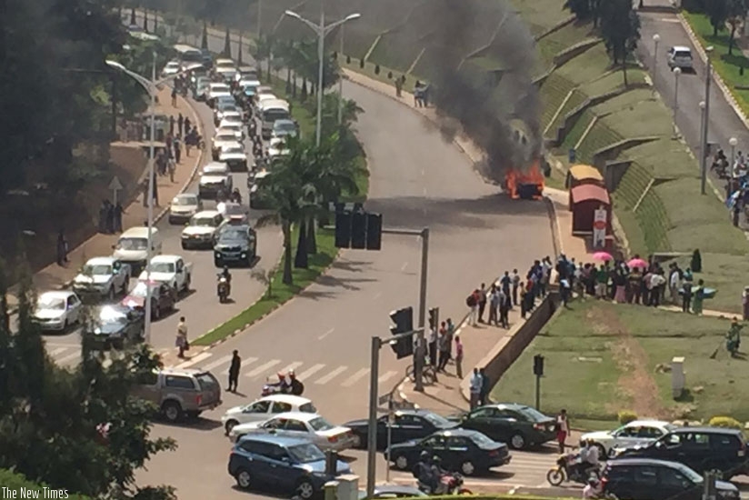 A Mercedes Benz caught fire at Gishushu No one was hurt. (Photos by Peterson Tumwebaze and Faustin Niyigena)