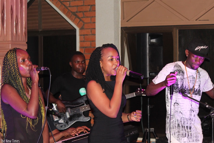 Nina (left), Charly (middle) and Big Fizzo perform their hit 'Indoro' at one of the side shows. (Moses Opobo)