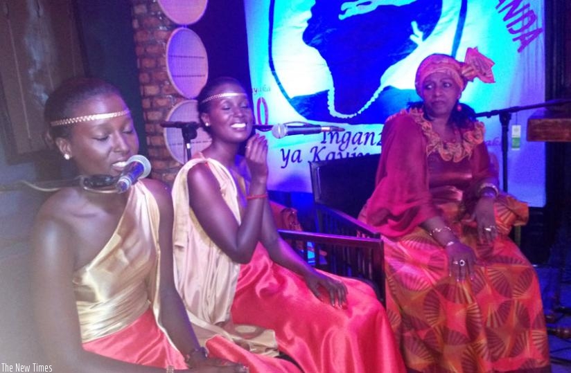Kayirebwa performing along with the girls who backed her. (Julius Bizimungu)