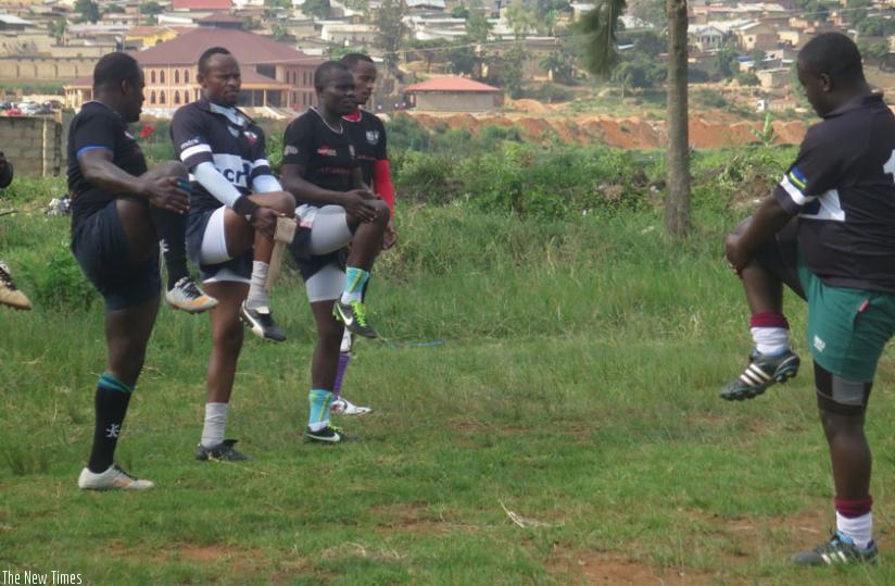 League side Lion de Fer players warm up before a league game last season. (Stephen Kalimba)