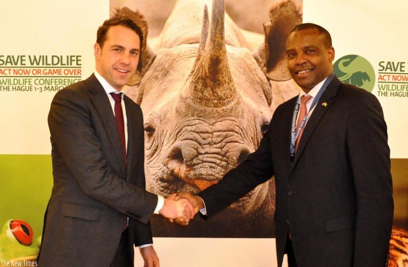 Dutch minister for agriculture Martijn van Dam (L) and Amb. Karabaranga. (Courtesy)