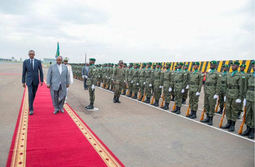 President Kagame and his Djiboutian counterpart Ismail Omar Guelleh at Kigali International Airport yesterday. (Village Urugwiro)