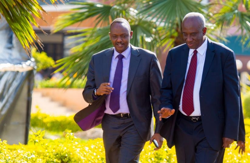 Prosecutor-General Richard Muhumuza (L) chats with Jallow in Kigali yesterday. (Timothy Kisambira)