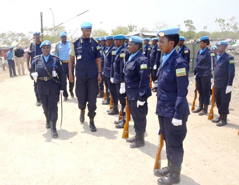 Munyambo inspects a Guard of Honour mounted by Rwanda FPU in South Sudan on Monday. (Courtesy)