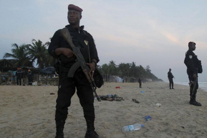 Soldiers stand guard on the beach in Grand-Bassam, Ivory Coast, on Sunday. (Net photo)