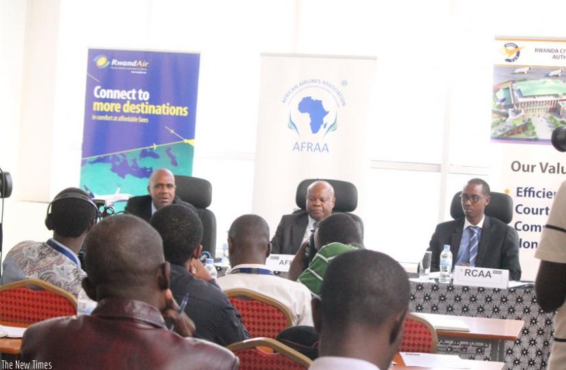 L-R: John Mirenge, RwandAir Chief Executive Officer, Dr. Chingosho, AFRAA Secretary General and Eustache Ngoga, the Director of Legal Affairs, Rwanda Civil aviation Authority during the meeting yesterday in Kigali. (Peterson Tumwebaze)
