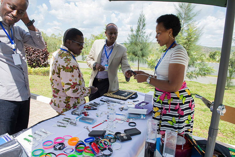 Senior government officials inspect Agaciro Development Fund promotional products at the just concluded National Leadership Retreat in Gabiro (Village Urugwiro)