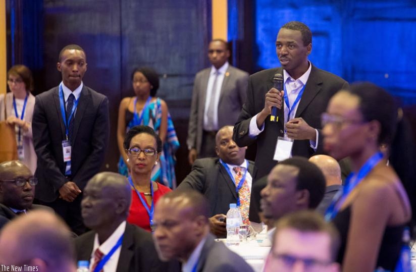 A participant asks a question at the African Transformation Forum in Kigali. (T.Kisambira)