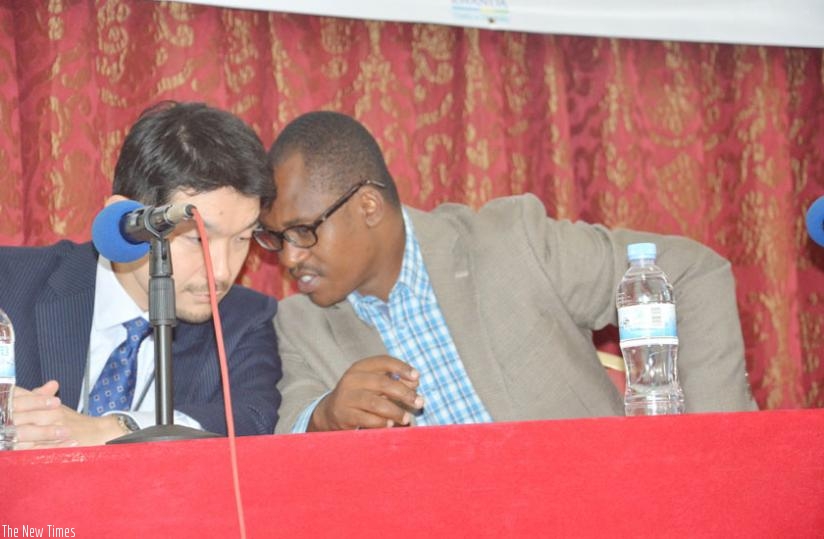 Sano (R) and JICA's senior representative and deputy head of office Ryutaro Murotaini at the meeting in Kigali yesterday. (Michel Nkurunziza)