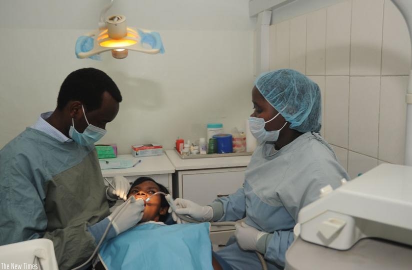Dentists work on a patient at University of Rwanda's College of Medicine and Health Sciences. (File)