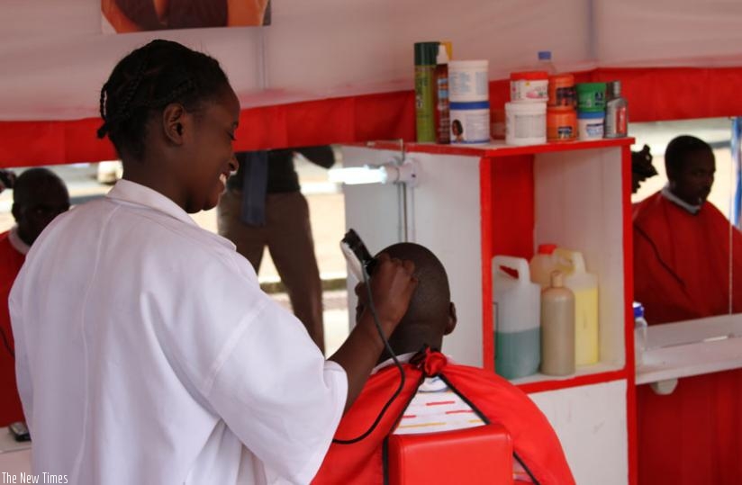 A barber shaving a customer.  The new association will boost the salon business. (File)