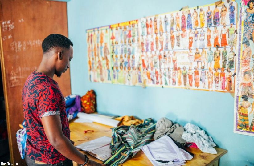 Mathew Rugamba prepares for work at his workshop. (File)