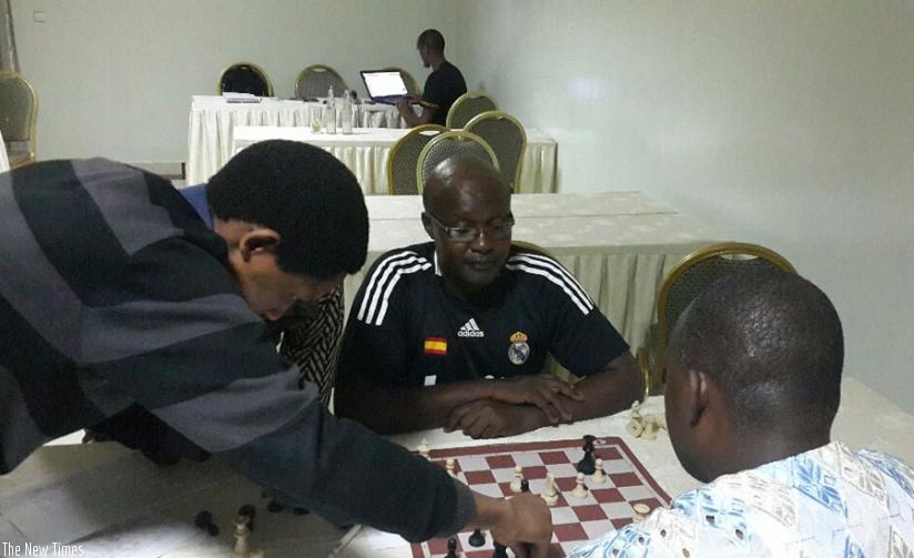 There was an equally entertaining post-match analysis after Fidele Mutabazi (in black t-shirt) beat Rugema Ngarambe in round nine. (J. Karuhanga)