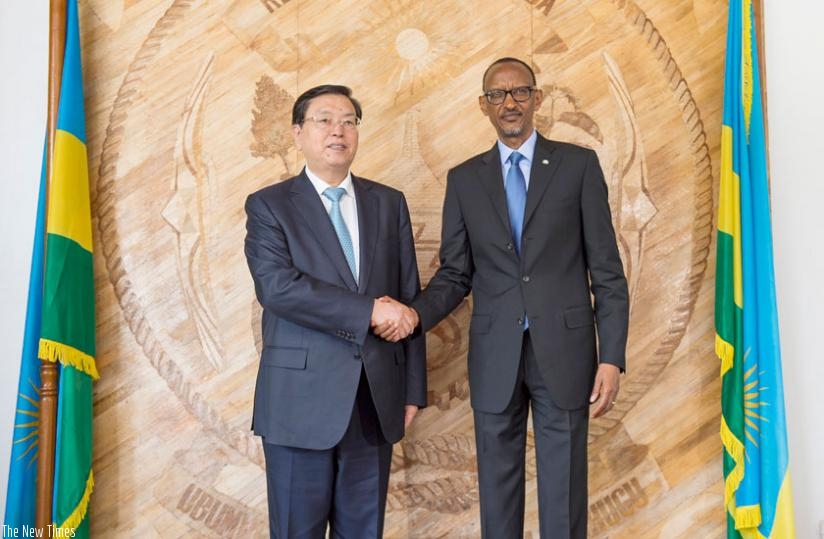 President Kagame welcomes Zhang to Village Urugwiro in Kigali yesterday. (Village Urugwiro)