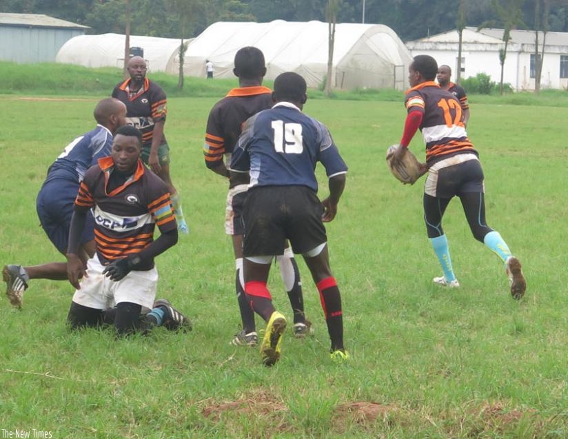 Remera Buffalo's full back, Aime Ndahirwa, with ball, in action against Thousand Hills at Utexrwa. (Stephen Kalimba)