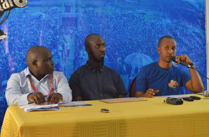Bralirwa Ltd representatives along with East African Promoters and Price Water Coopers representatives briefing the participants during the voting. (Julius Bizimungu)