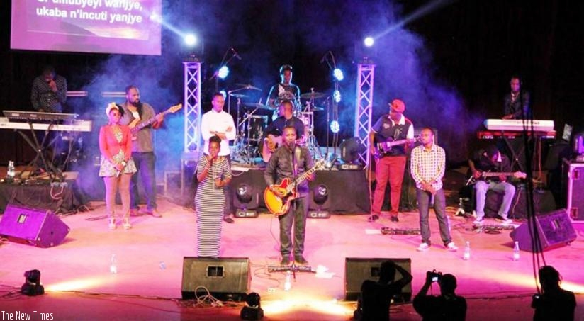 Upcoming artiste, Precious Nina Mugwiza (front left) joined Niyukuri (with guitar) on stage. (