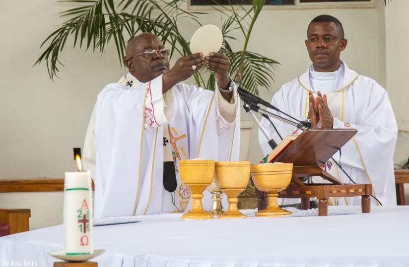 Monsignor Thadee Ntihinyurwa, the archbishop of Kigali, leads Easter Mass at Saint Michel Cathedral. (Doreen Umutesi)