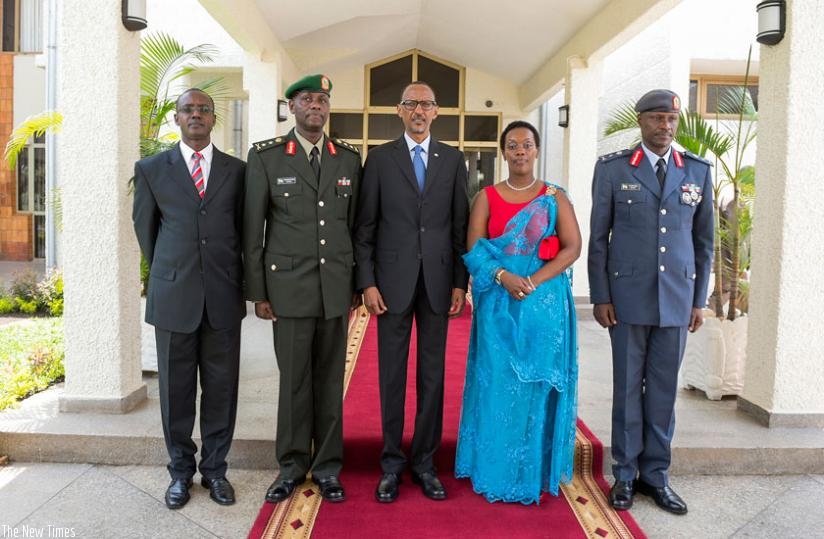 President Kagame poses for a photo with the newly-sworn in leaders; Dr Diane Gashumba, the Minister for Gender and Family Promotion (2nd R); Maj Gen Jacques Musemakweli, the RDF Chief of Staff, Land Forces (2nd L); Brig Gen Charles Karamba, the RDF Chief of Staff, Air Force (R); and Brig Gen Joseph Nzabamwita, the Secretary-General, National Intelligence and Security Services (L). (Village Urugwiro)