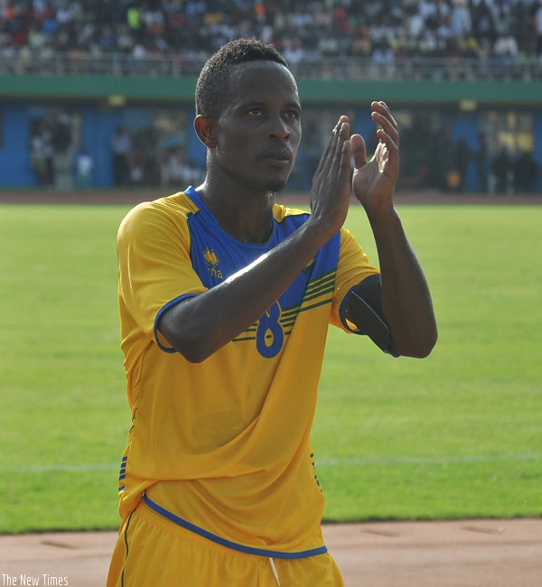 Skipper Haruna Niyonzima claps to celebrate the 5-0 victory. (Peter Kamasa)
