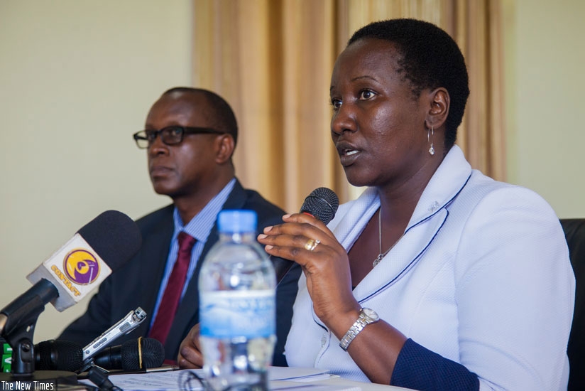 Minister of sports and culture, Julienne Uwacu (R) with Dr Bizimana, the Executive Secretary of the National Commission for the Fight against Genocide (CNLG) during the press conference (Faustin Niyigena)