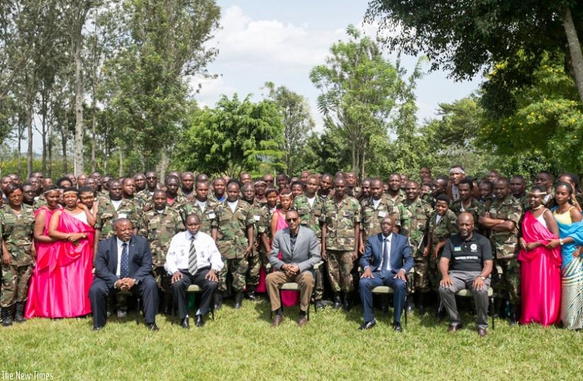 President Paul Kagame poses for a group photo with the local leaders from the Northern Province, along with Francis Kaboneka, the Minister for Local Government (seated, 2nd right); Boniface Rucagu, Chairperson, National Itorero Commission (2nd L), Aime Bosenibamwe, Governor, Northern Province (L); and Wellars Gasamagera, coordinator of the just-concluded course (R), at the closing of the training for more than 800 local leaders at the Rwanda Defence Forces Gabiro Combat Training Centre in Gatsibo District, Eastern Province, yesterday. (Village Urugwiro)