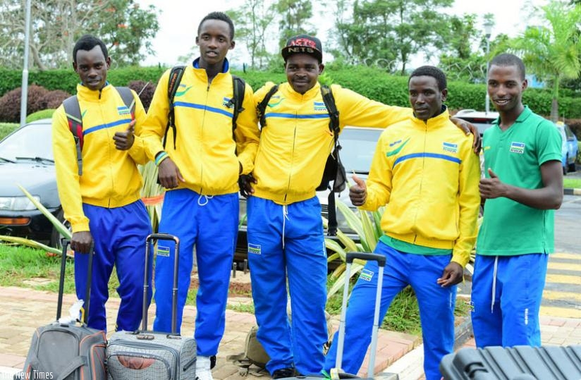 Team Rwanda riders at Kigali International Airport on arrival from Algeria on Wednesday afternoon. (Courtesy)