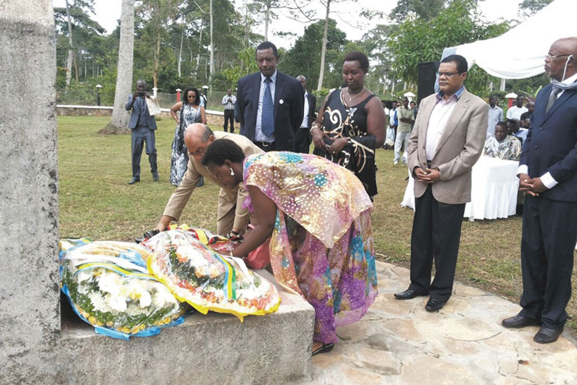 Ugandan philanthropist Muhmood Thobani lays a wreath on one of the mass graves at Ggolo, Mpigi district last year. Looking on behind on the left is Rwanda's High Commissioner to Ug....